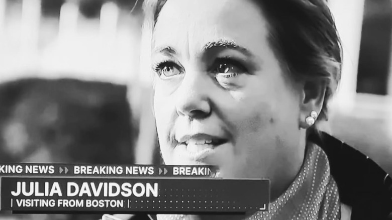 Julia Collin Davison in black and white photo of breaking news segment