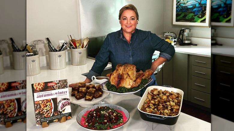 Julia Collin Davison posts with turkey and other autumn sides with "The Complete Autumn & Winter Cookbook"