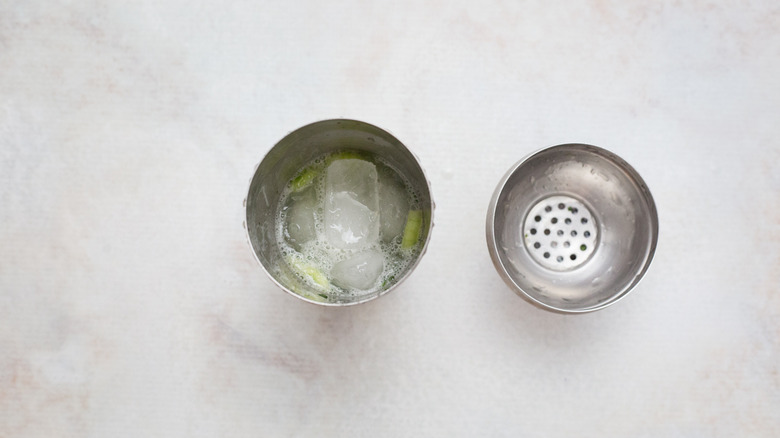 shaken cocktail in open shaker