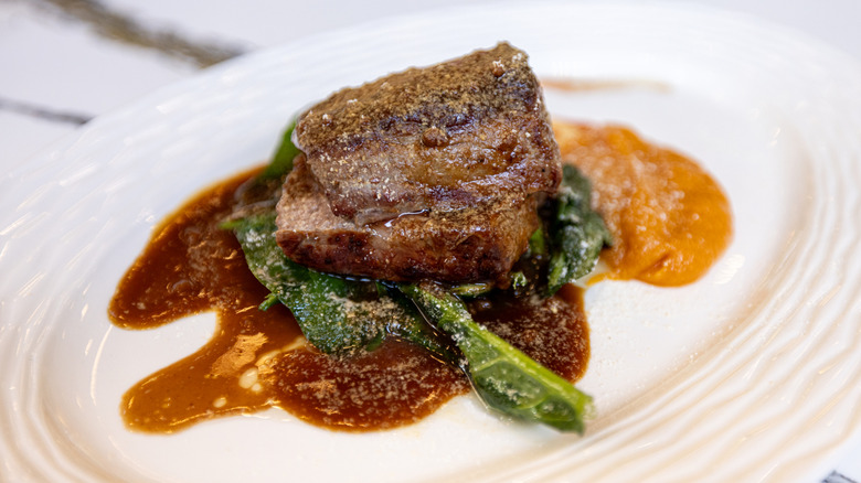 Plated steak with sauce