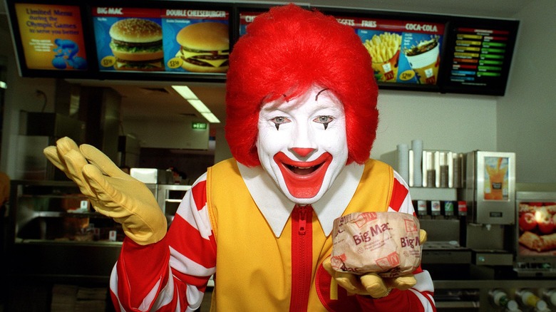 Ronald McDonald behind counter