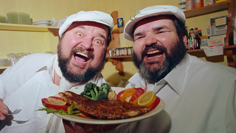 Paul Prudhomme with blackened redfish