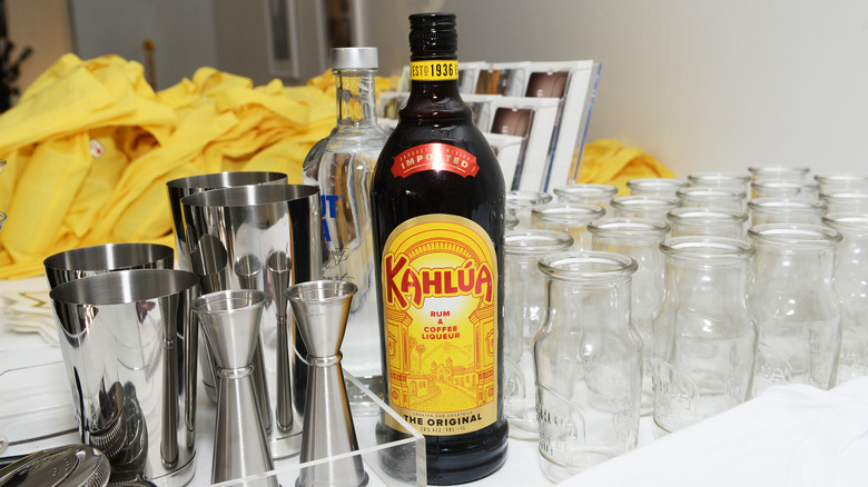 Kahlúa bottle with cocktail shakers