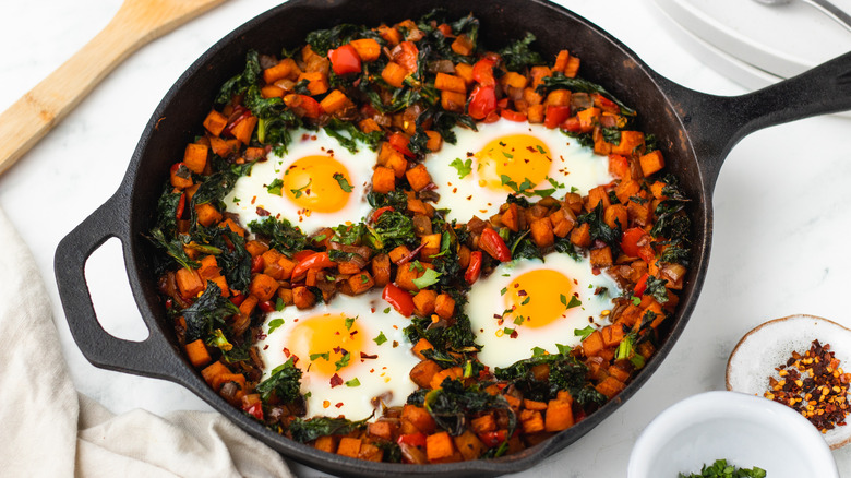 Kale and sweet potato hash in skillet
