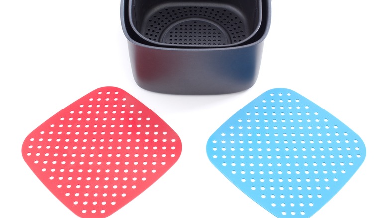 Air fryer with two silicone liners