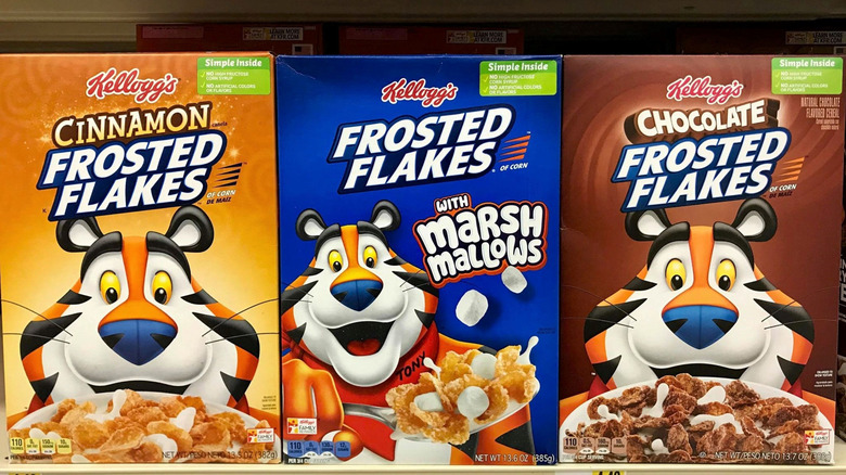 frosted flakes cereal boxes on store shelf
