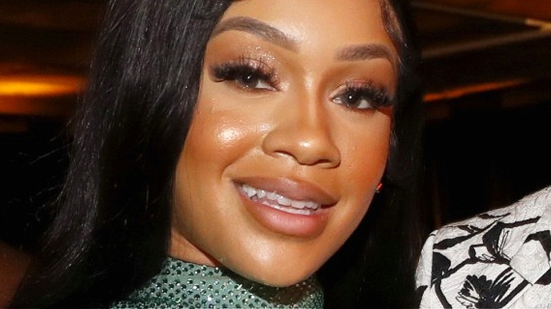 Saweetie smiling 