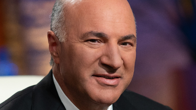 Kevin O'Leary smiling slightly