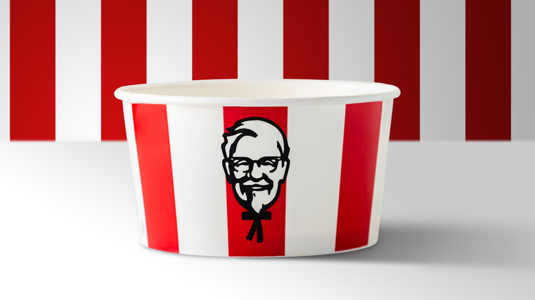 KFC bucket against red and white background