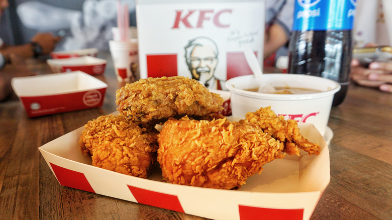 Close-up of KFC bucket outside of KFC