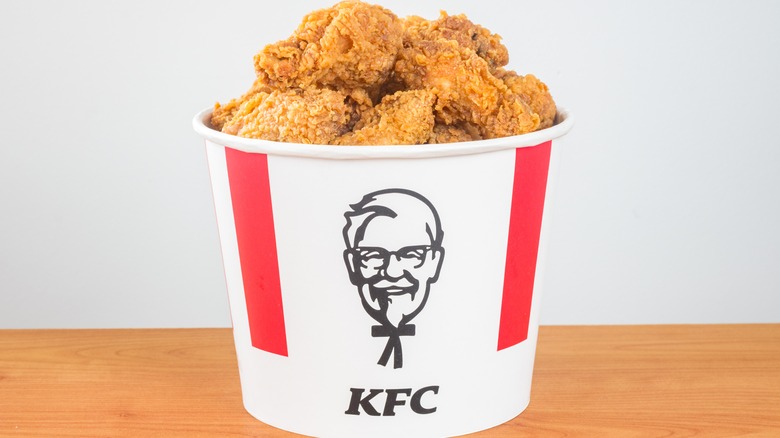bucket of chicken from KFC with brand logo
