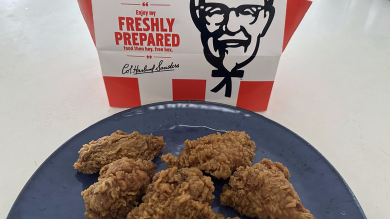 KFC wings on plate with box