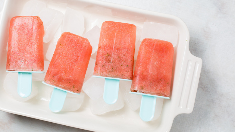 watermelon popsicles in ivory dish