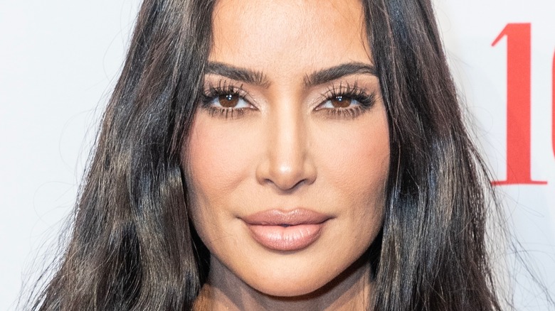 kim kardashian slightly smiles