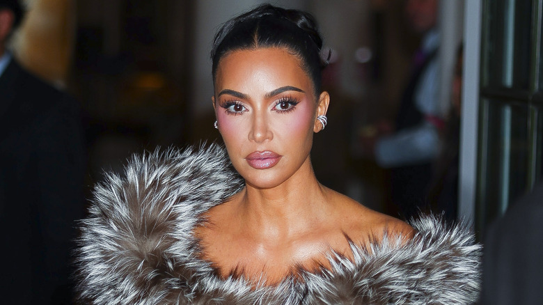 Kim Kardashian in furry collar