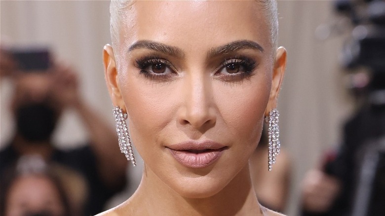 Kim Kardashian long earrings