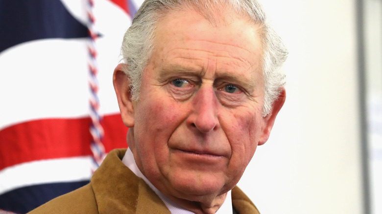 King Charles III sad eyes