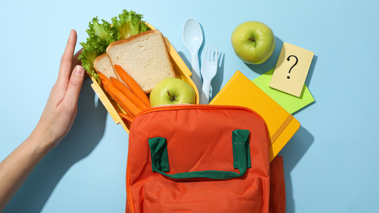 Various food items coming out of backpack