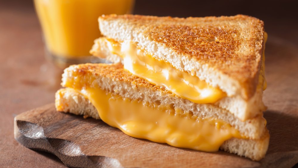 grilled cheese with cheese oozing out