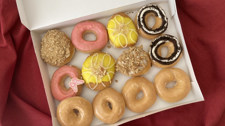 box of Dolly Krispy Kreme doughnuts