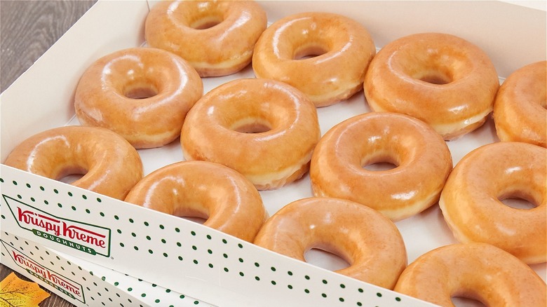 Glazed donuts in a white box
