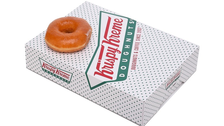 Krispy Kreme doughnut box with original glazed doughnut