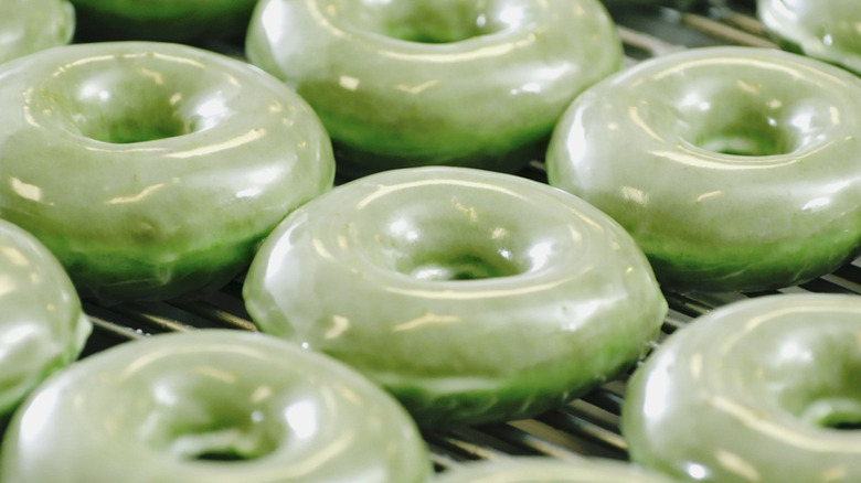 green Krispy Kreme glazed doughnuts