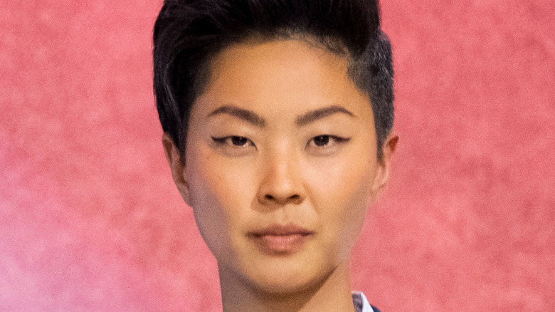 Iron Chef host Kristen Kish posing