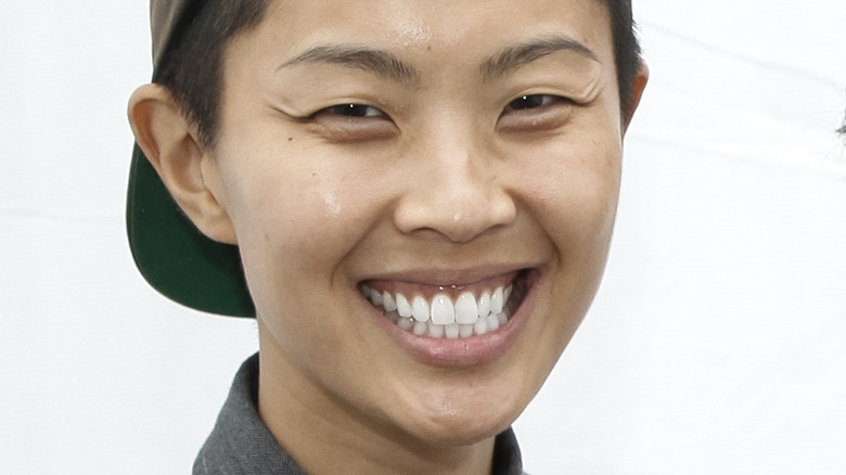 Kristen Kish smiling in cap