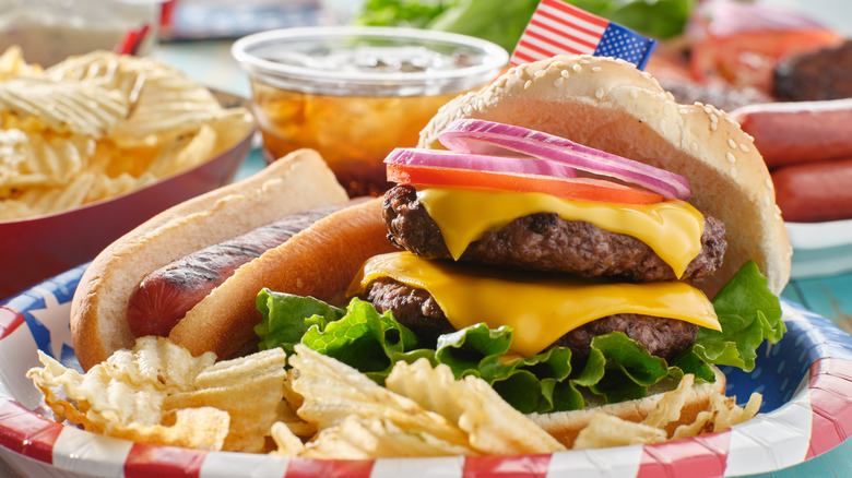 Hamburger and hot dog on plate