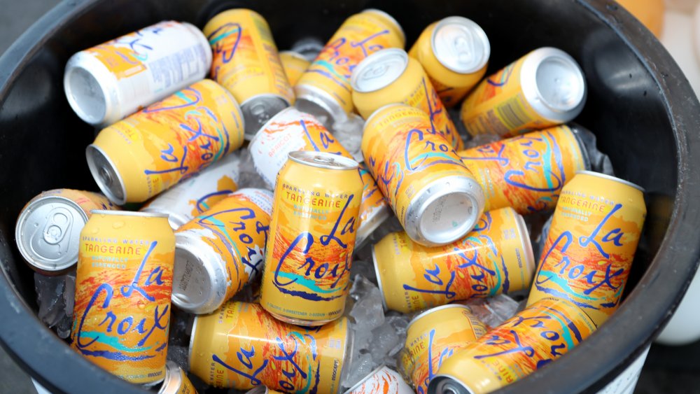Tangerine LaCroix cans sitting in ice