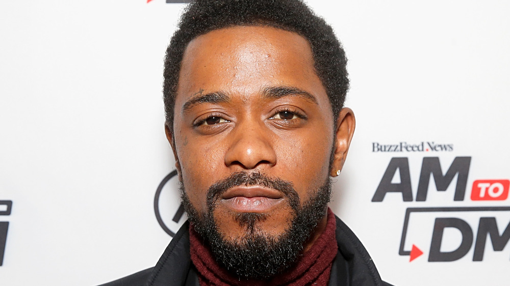 LaKeith Stanfield with a diamond earring