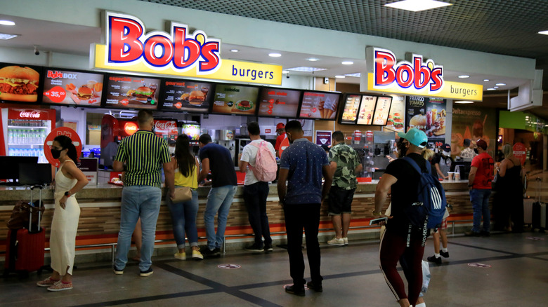Customers waiting in line for Bob's Burgers in Brazil