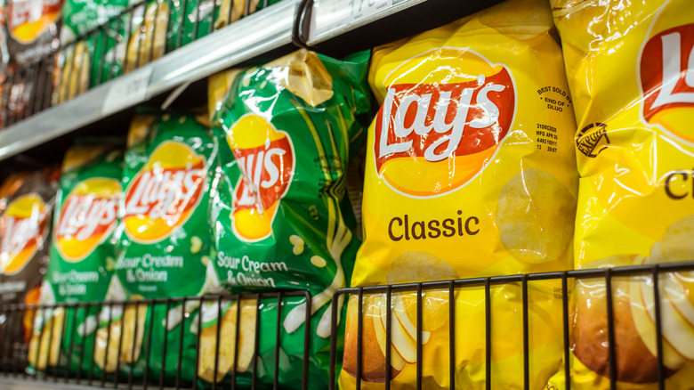 bags of Lay's chips on store shelf