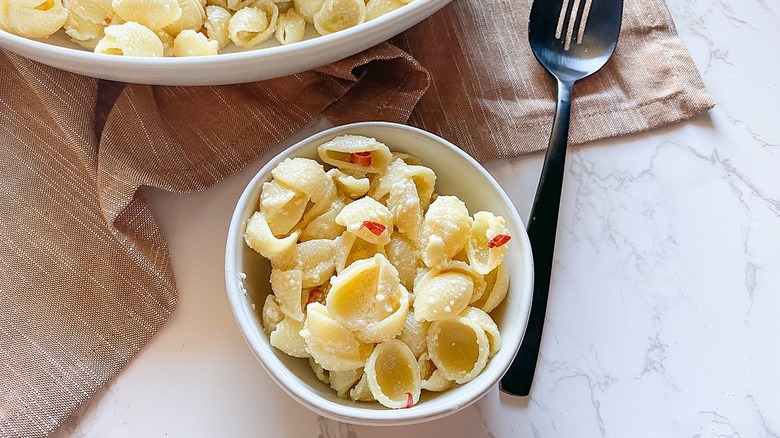 pasta shells in white ramekin