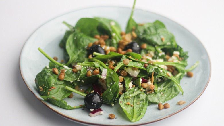 Lentil spinach salad on plate