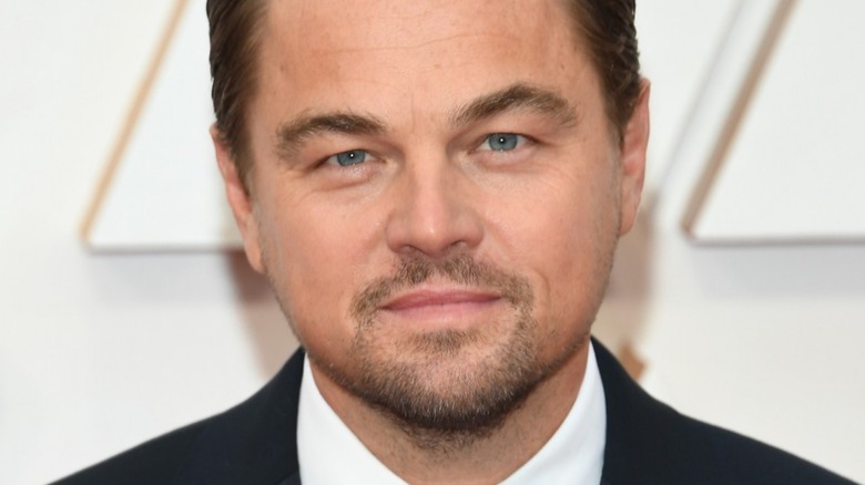 Leonardo DiCaprio smiles in a tuxedo