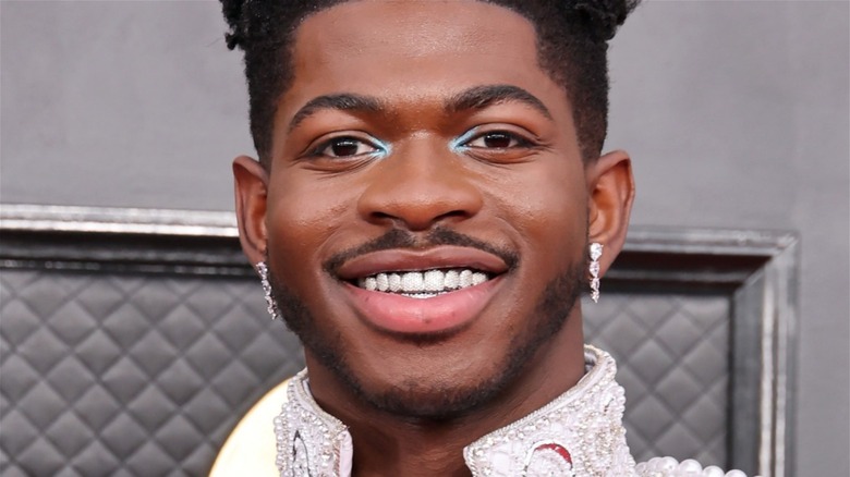 Lil Nas X smiling at press event