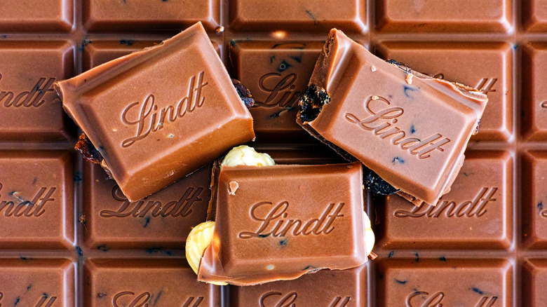 A Lindt chocolate bar, both the packaging and a square of the bar