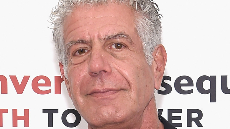 Anthony Bourdain smiling at event