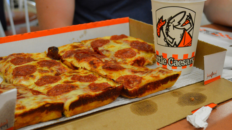 Little Caesar's pizza and cup