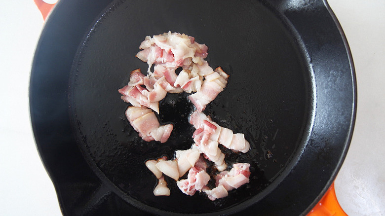bacon cooking in pan