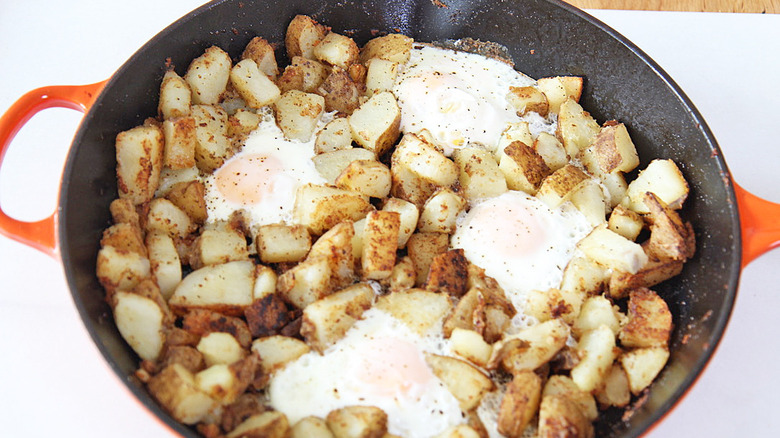 eggs and potatoes in skillet