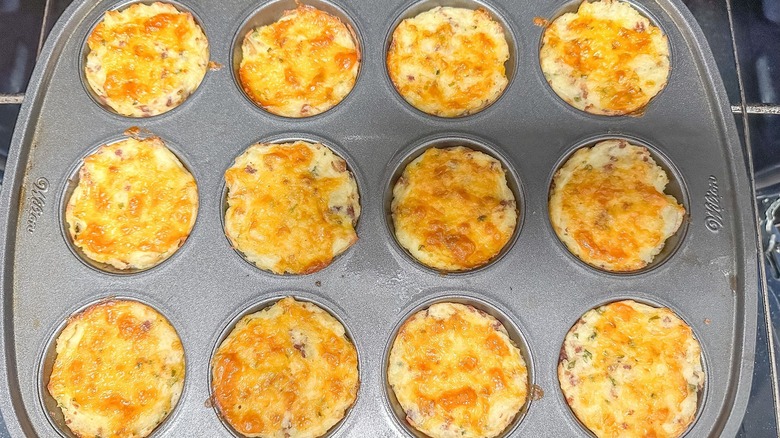 Baked mashed potato cups in muffin tin