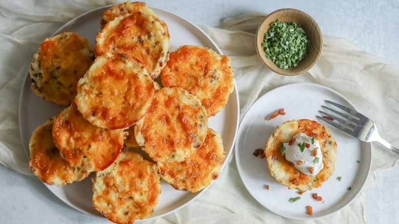 full plate of cheesy mashed potato cups
