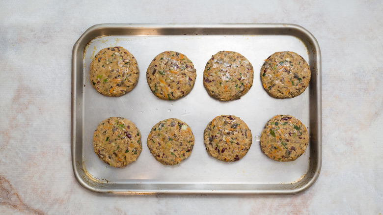 veggie burgers on baking sheet
