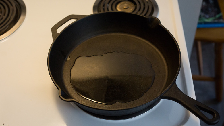 oil heating in cast iron pan
