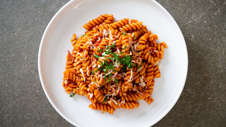 rotini with sauce and garnish