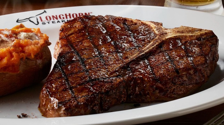 steak and sweet potato on plate