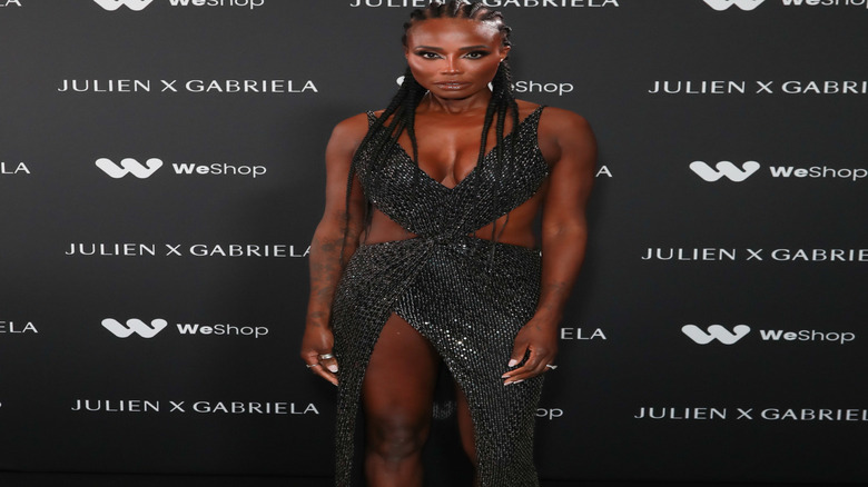 Lorraine Pascale posing in front of black backdrop
